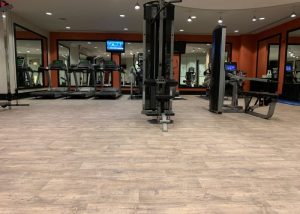 American Real Estate Partners Management fitness center flooring